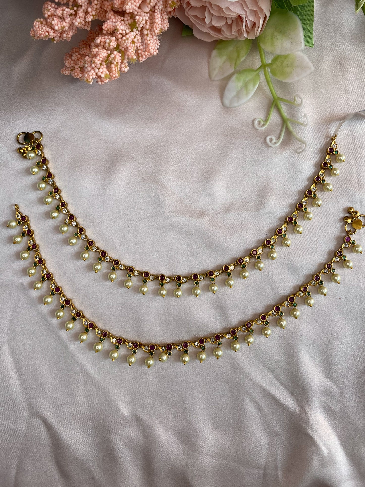 kemp with white stone anklets